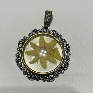 Vintage Silver and Gold Pendant with Yellow Star Design